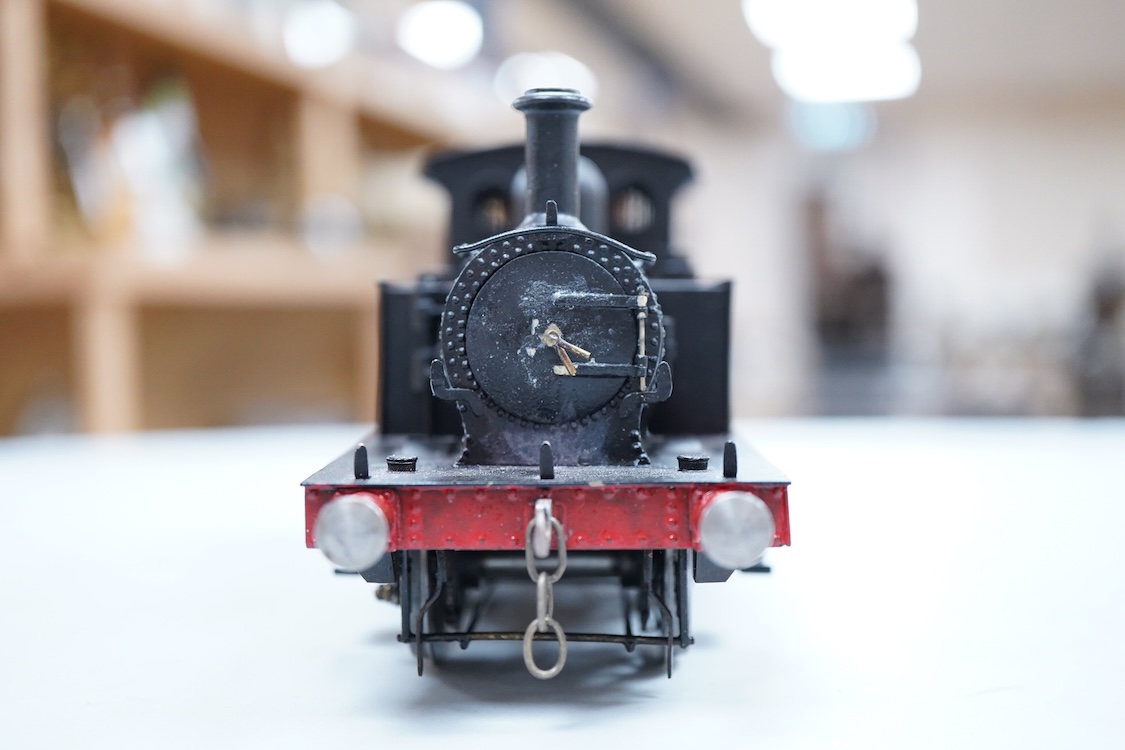 An 0 gauge scratch built model railway locomotive by John Worsley, a Southern Railway P class 0-6-0T, 1325, a detailed model with opening smoke box door showing the details of the blast pipe and boiler tube ends, sprung